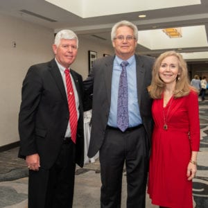 CEO Rob McCartney (center) with Maj. Gen. (Ret.) Mark Graham and his wife Carol